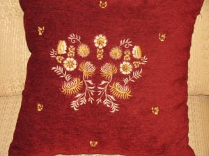 Red embroidered cushion